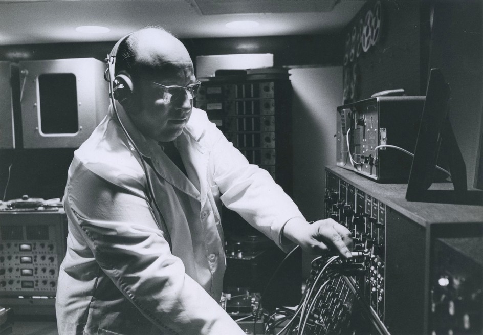 Jean-Jacques Perrey and his Moog modular synthesizer at his Carroll Music electronic music studio in New York City, late 1960s. Visible in the background are Altec monitors and Ampex 440 tape machine.