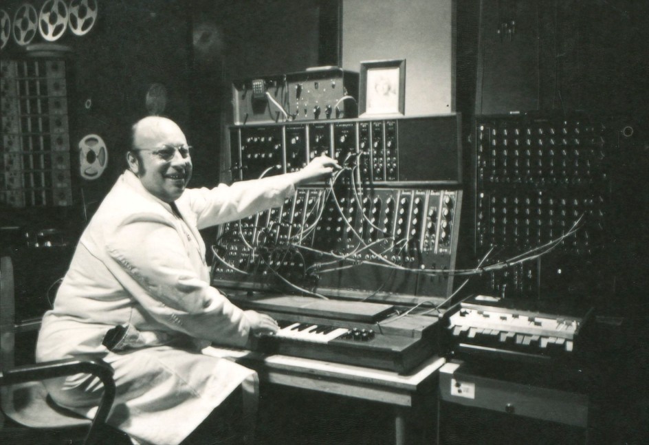 Jean-Jacques Perrey and his Moog modular synthesizer at his Carroll Music electronic music studio in New York City, late 1960s. Other visible equipment includes a Hammond Condor guitar synthesizer and a Conn Strobotuner.
