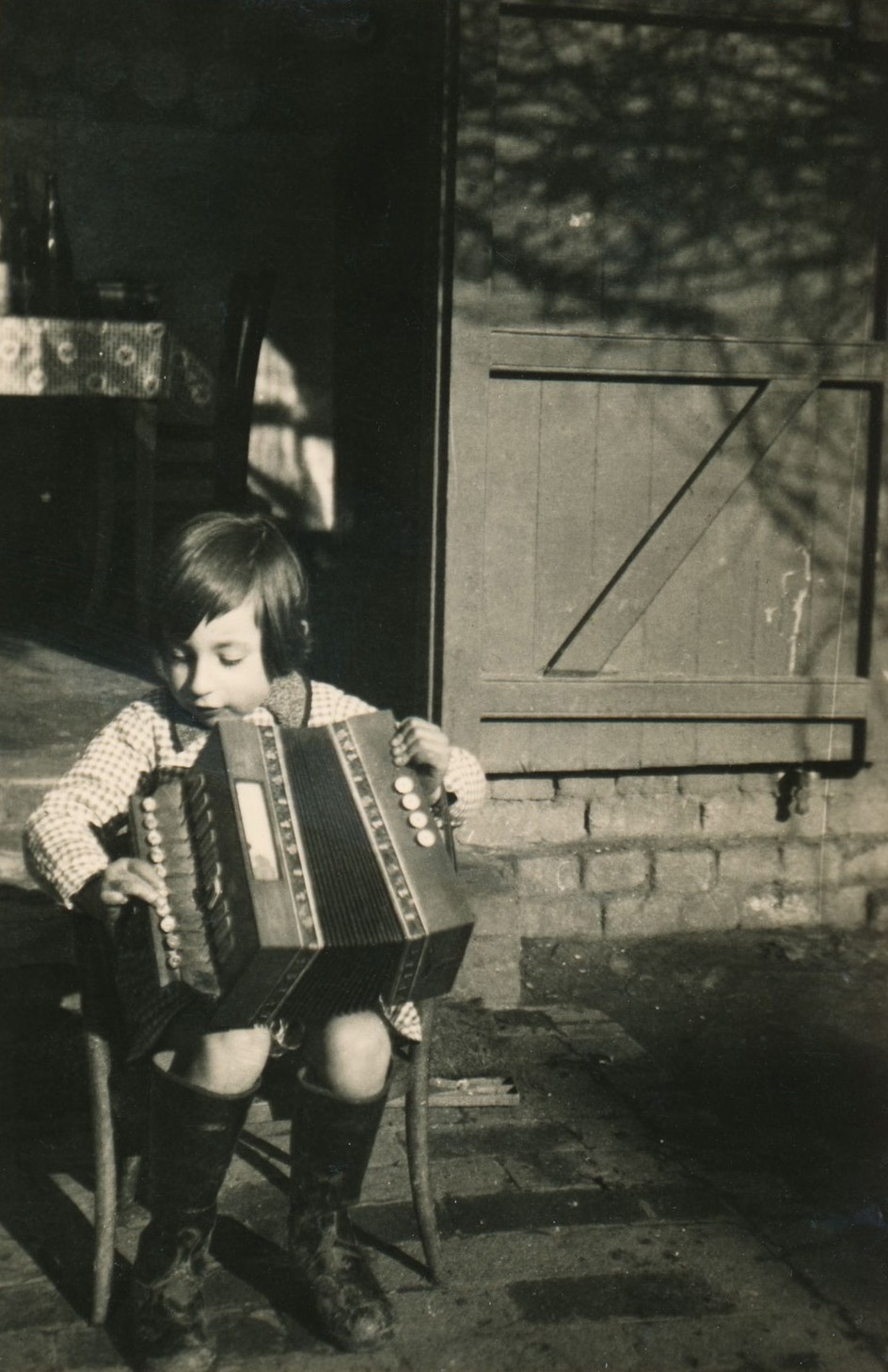 Jean Marcel Leroy playing accordion at five years old, some years before he took on the moniker Jean-Jacques Perrey. The button accordion was his first instrument.